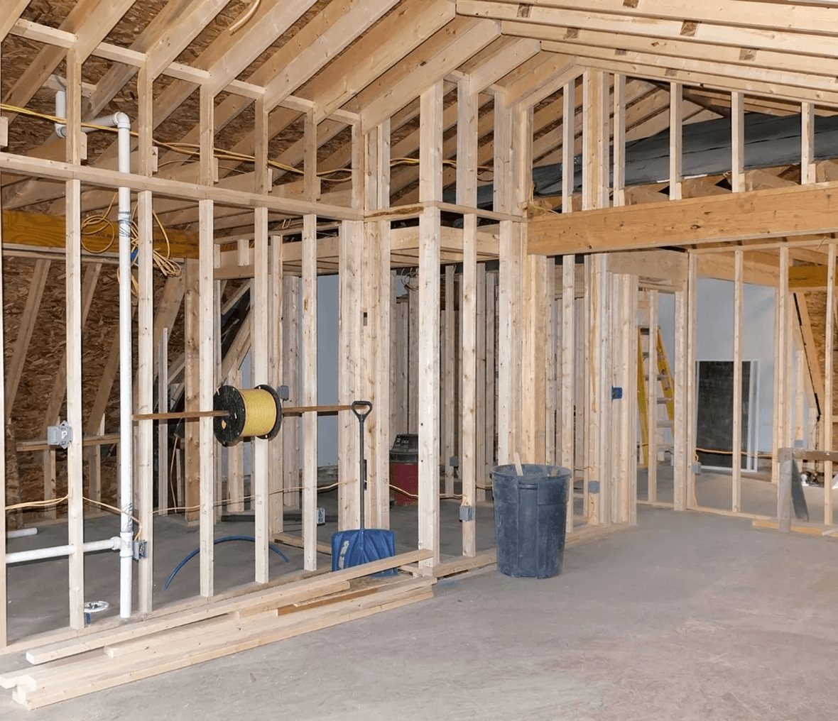 House under construction with wooden framing.