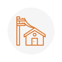 House with power lines icon in circle.